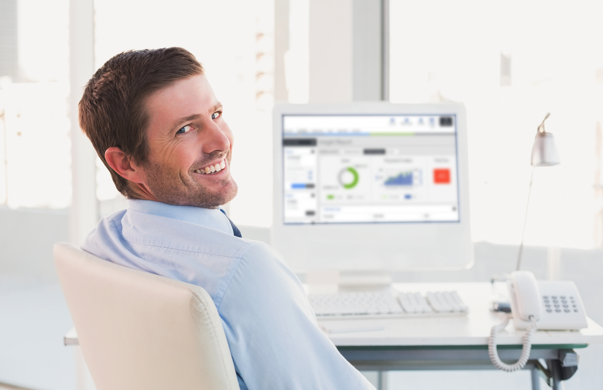 man sitting at work space